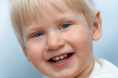 Child Smiling with following a pulpotomy that saved his tooth by Douglas L. Park, DDS, Pediatric Dentistry in Gresham, OR Child Smiling with following a pulpotomy that saved his tooth by Douglas L. Park, DDS, Pediatric Dentistry in Gresham, OR